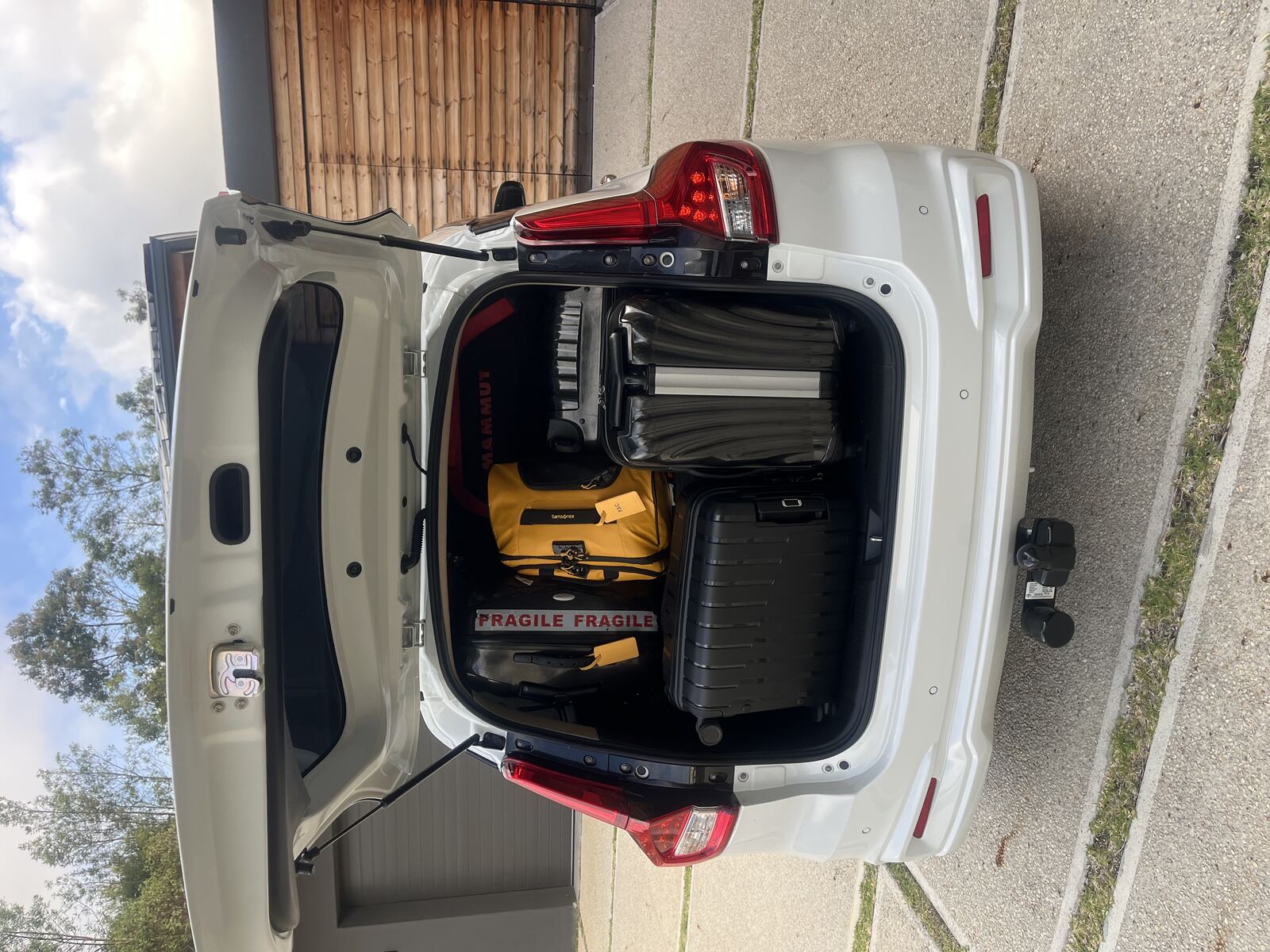 Toyota Rumion boot packed with suitcases and luggage